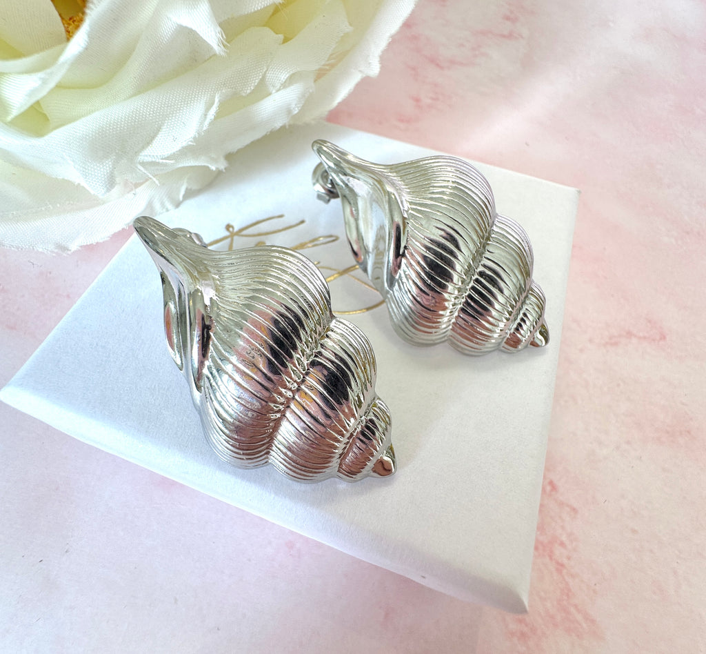 Silver oversized Seashell stud earrings.