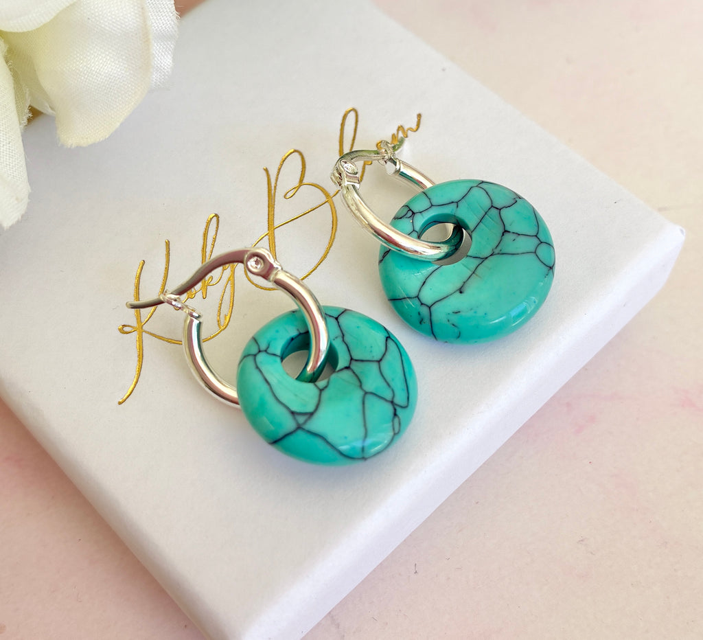 Silver Turquoise Donut earrings.