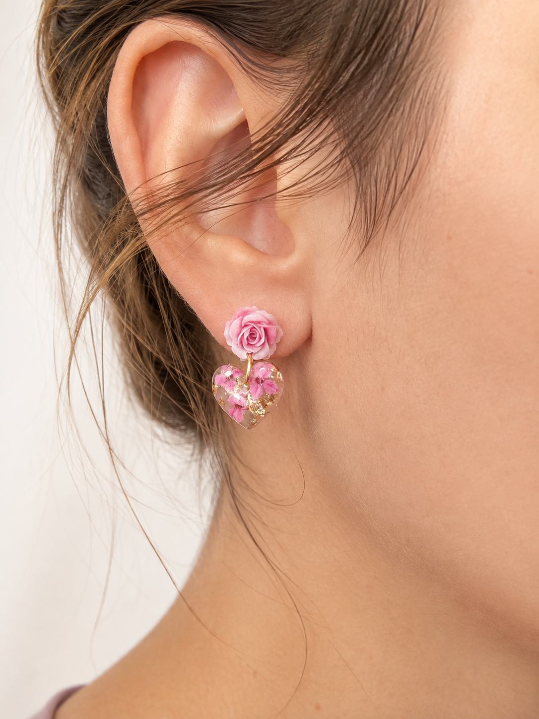 Pink Rose Drop Heart bloom stud earrings.
