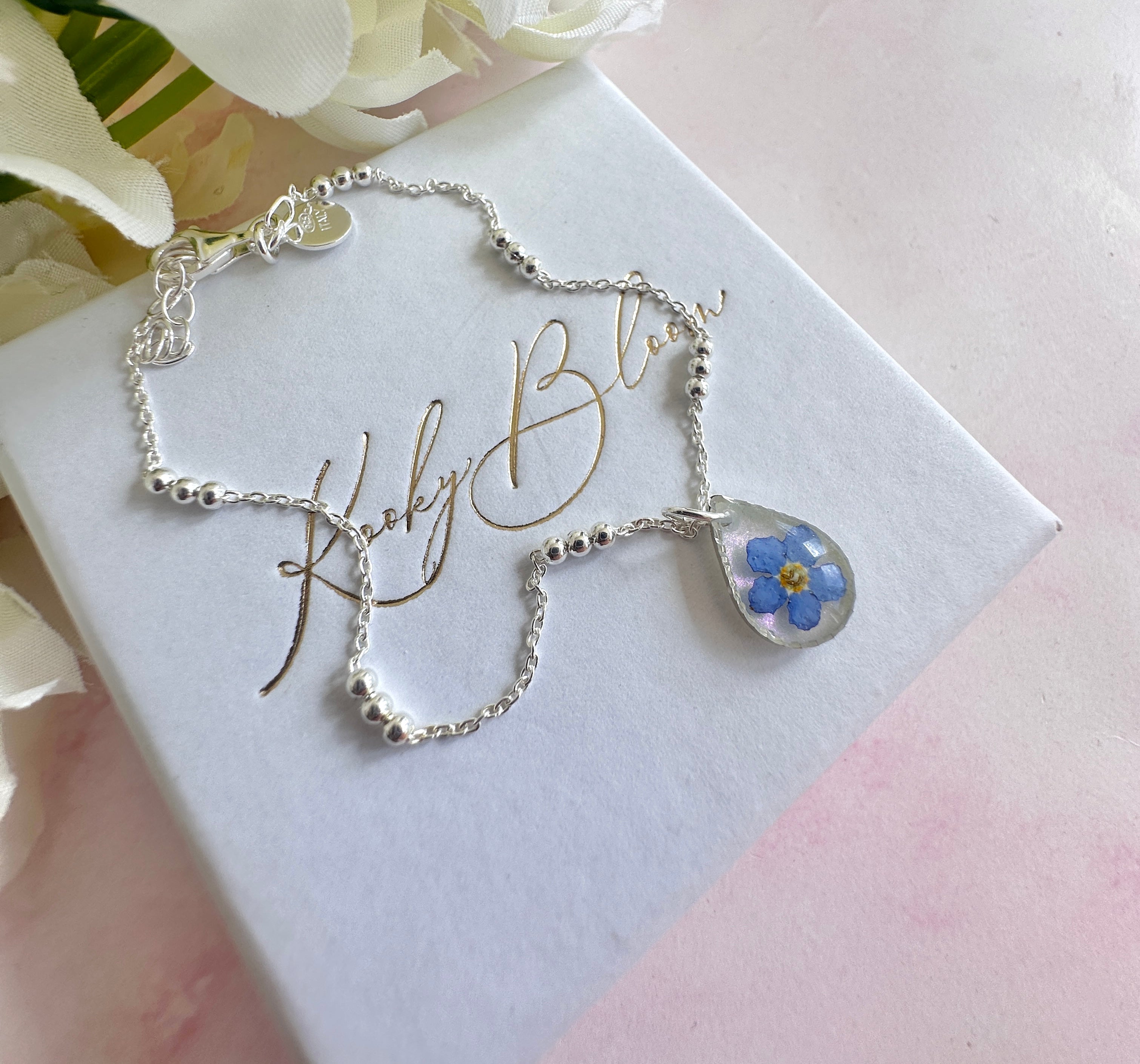 925 sterling silver Forget me not flower Teardrop bracelet.