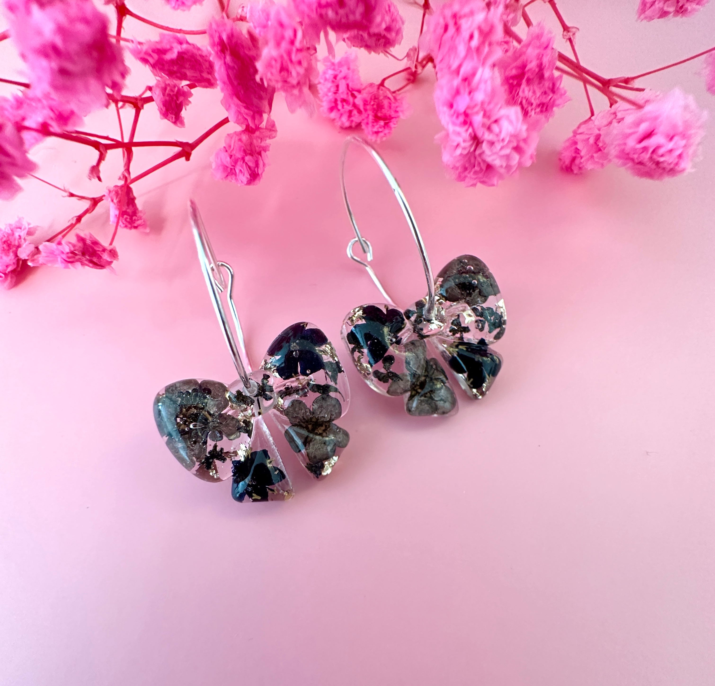 Black ebony Bloom Bow hoop Earrings.