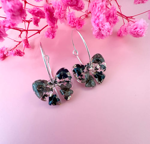 Black ebony Bloom Bow hoop Earrings.
