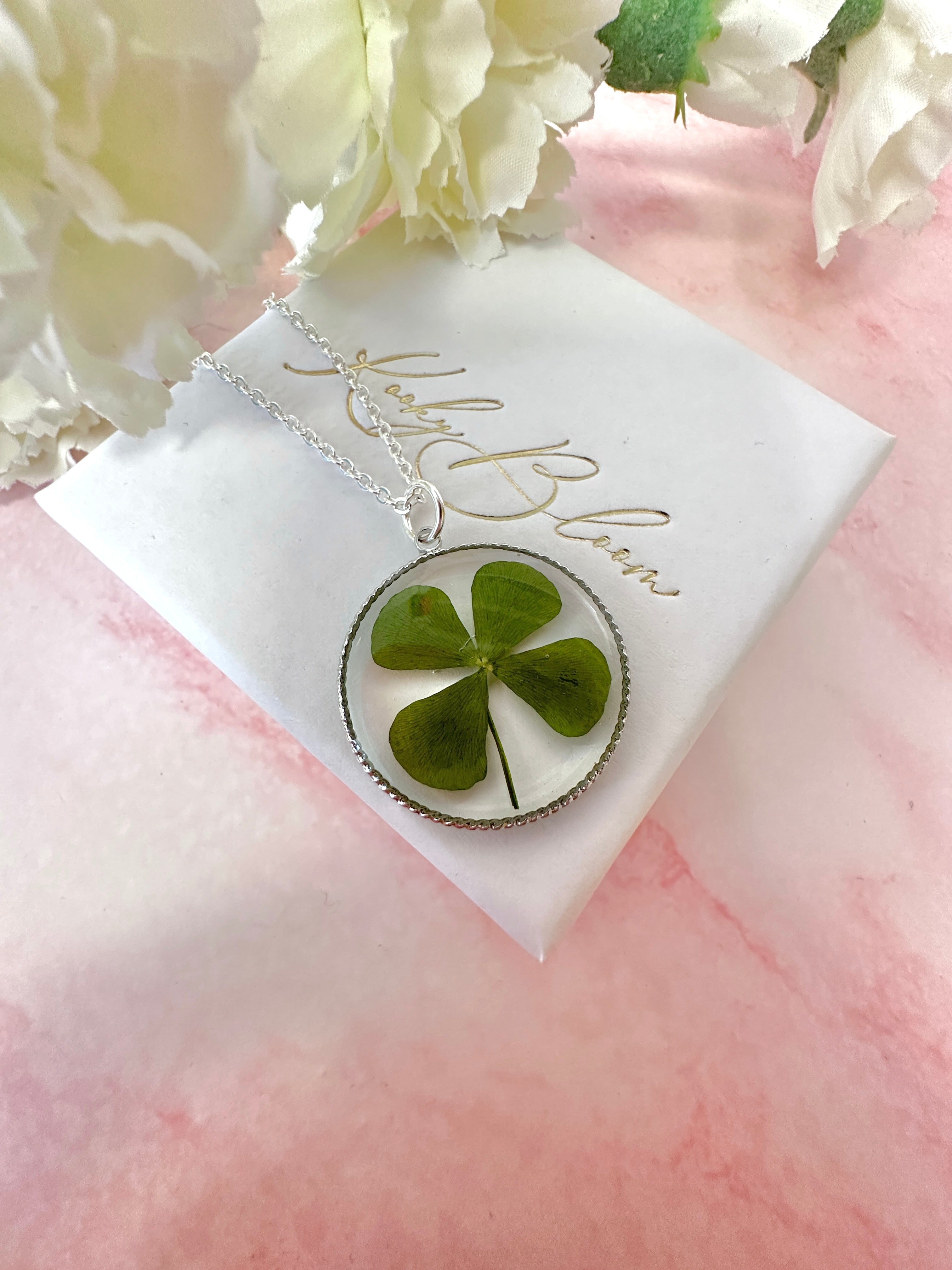 Silver Lucky four leaf clover necklace.