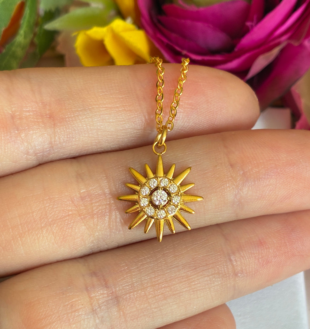 Gold CZ Star Sun ray Necklace.
