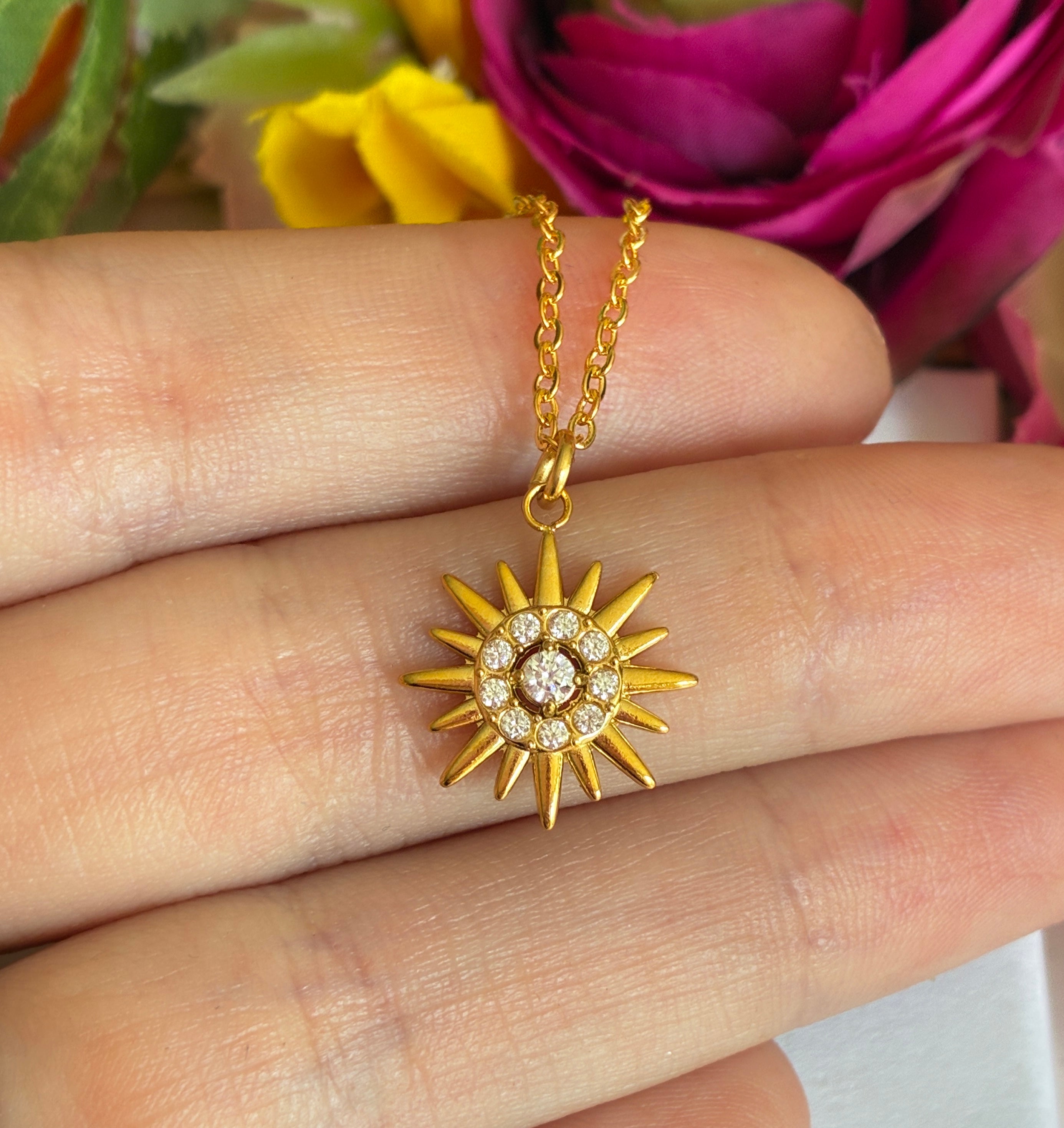 Gold CZ Star Sun ray Necklace.