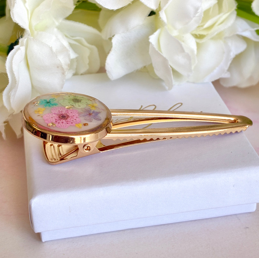 Large Pastel flower gold alligator hair clip.