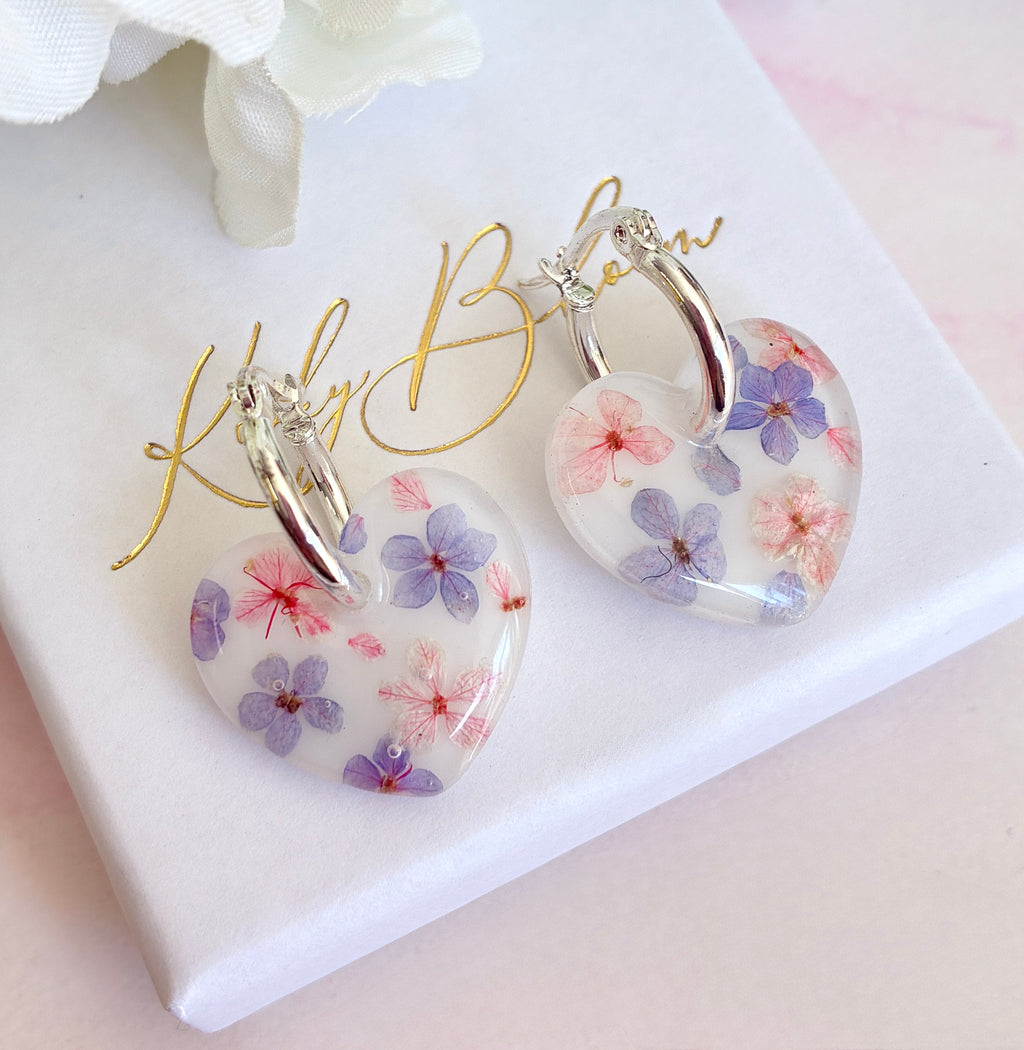Marshmallow bloom heart earrings.