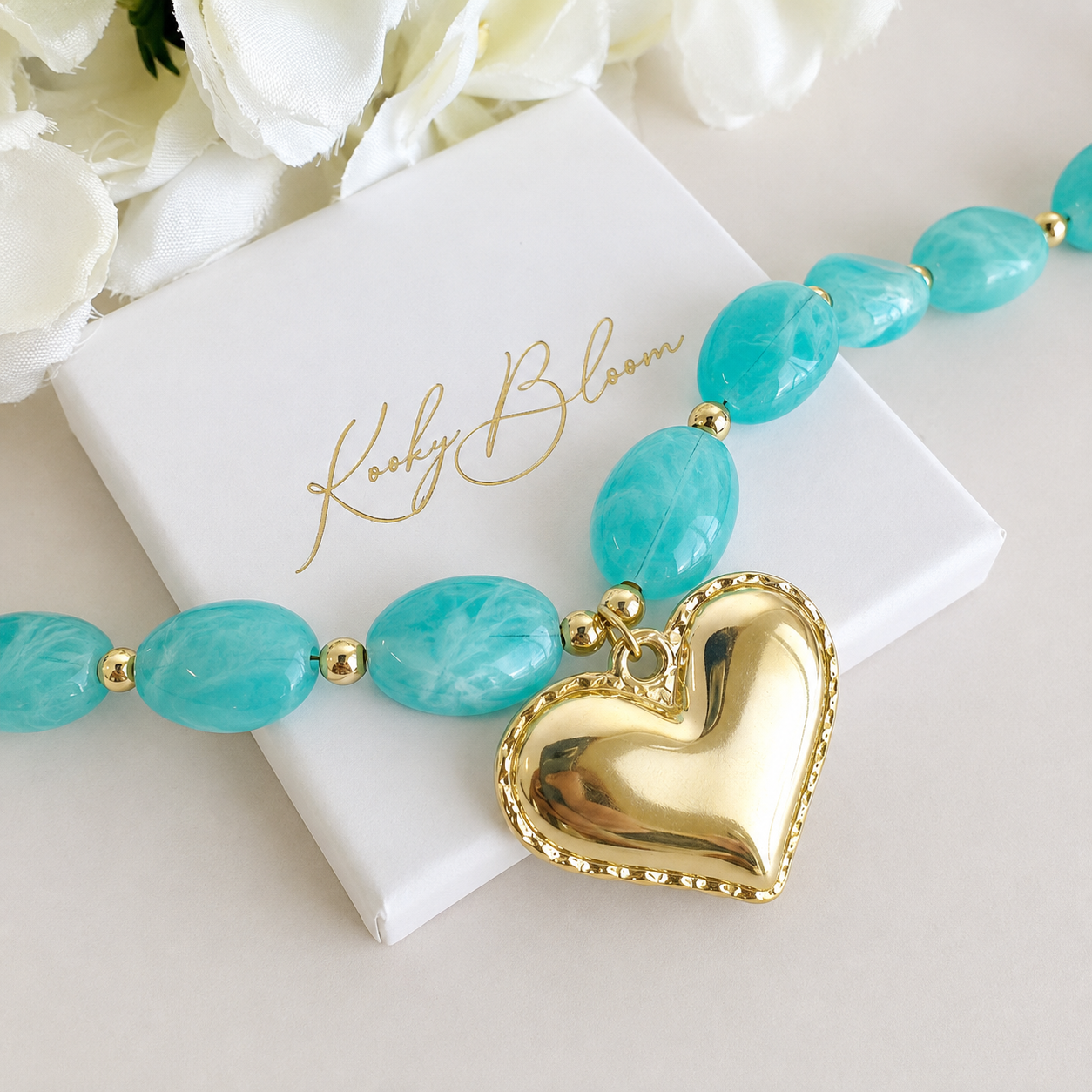 Gold chunky Aqua stone Heart necklace.