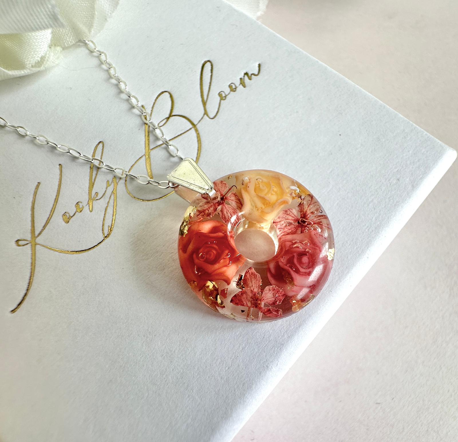 Silver terracotta rose donut necklace
