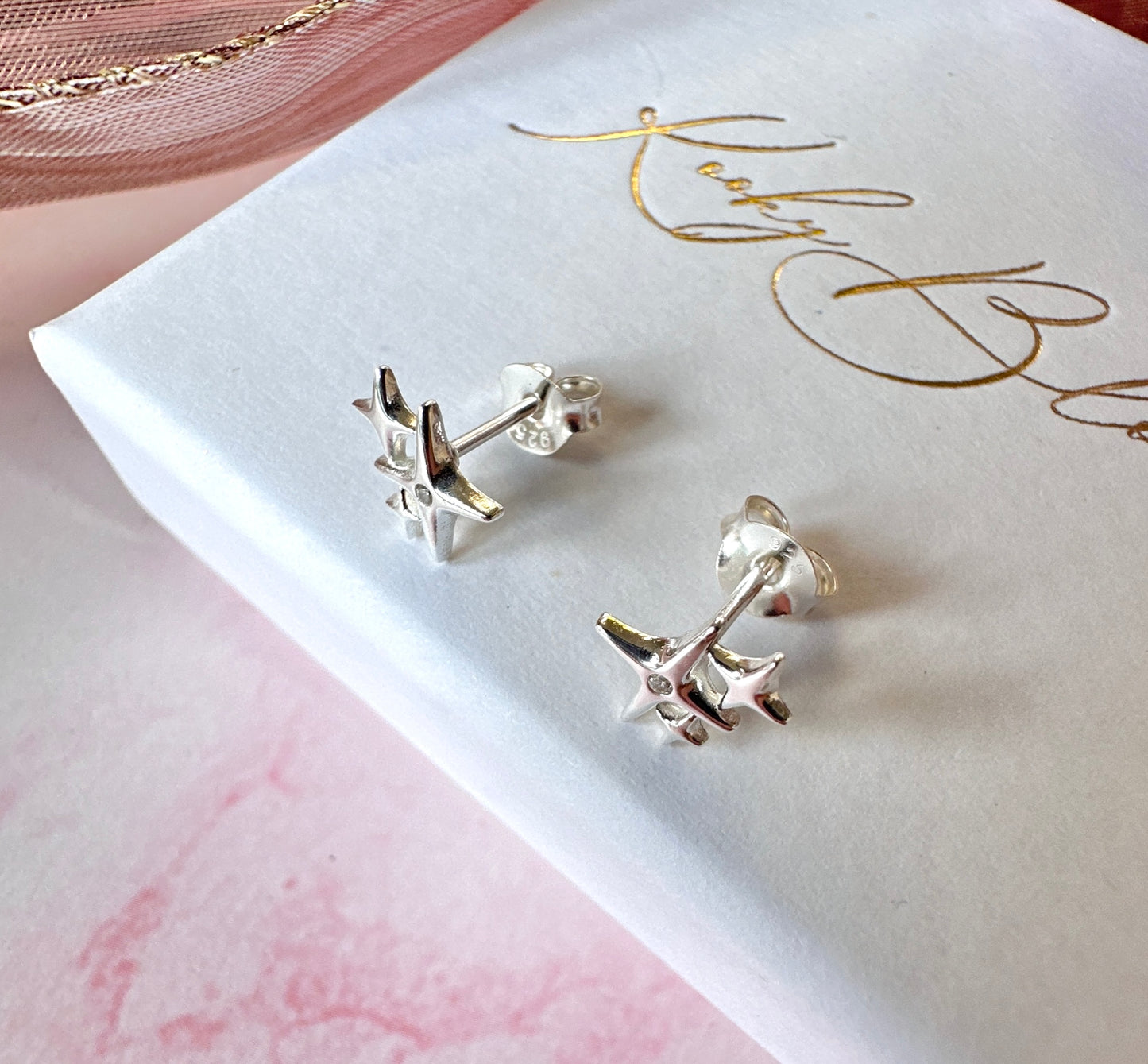 925 Sterling silver Twinkle Star stud earrings.