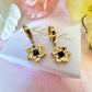 Gold Blue stone Flower Huggie earrings.