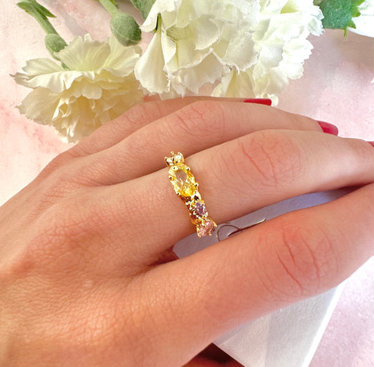 Gold pastel CZ adjustable ring.