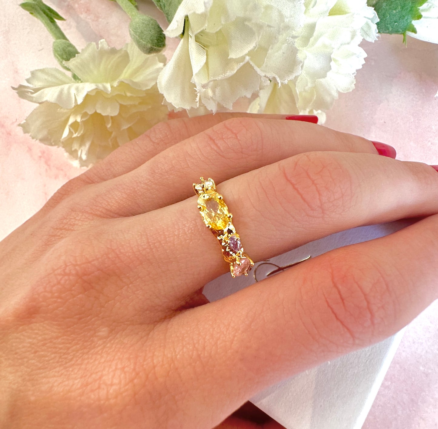 Gold pastel CZ adjustable ring.
