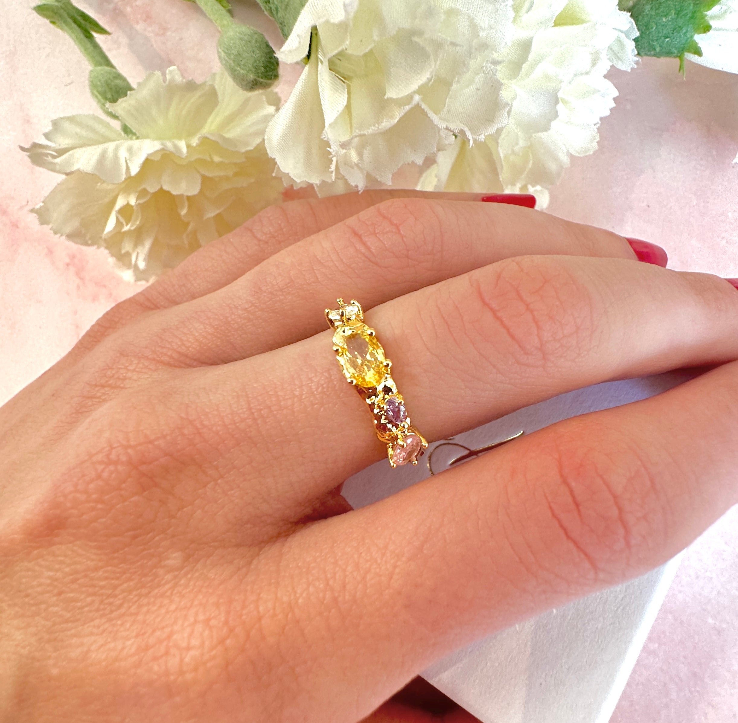 Gold pastel CZ adjustable ring.