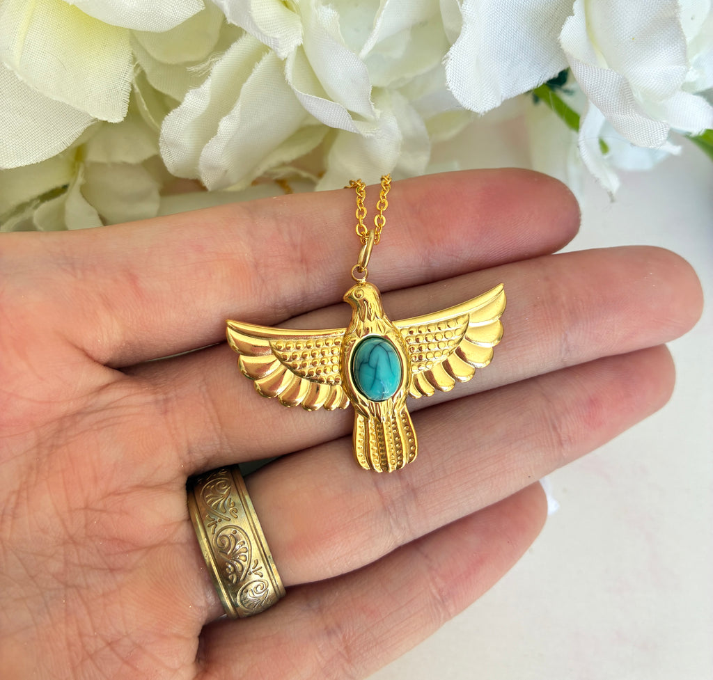 Gold Turquoise Eagle necklace.