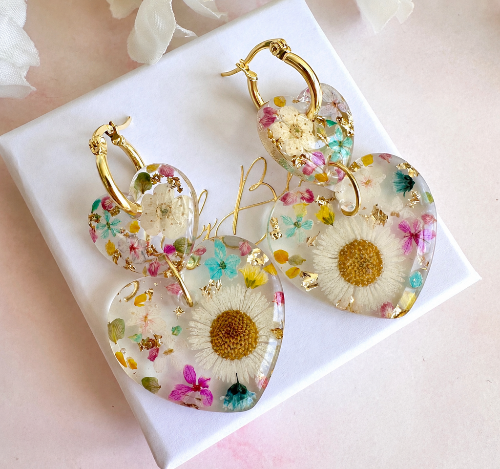 Daisy confetti double heart drop hoop earrings.