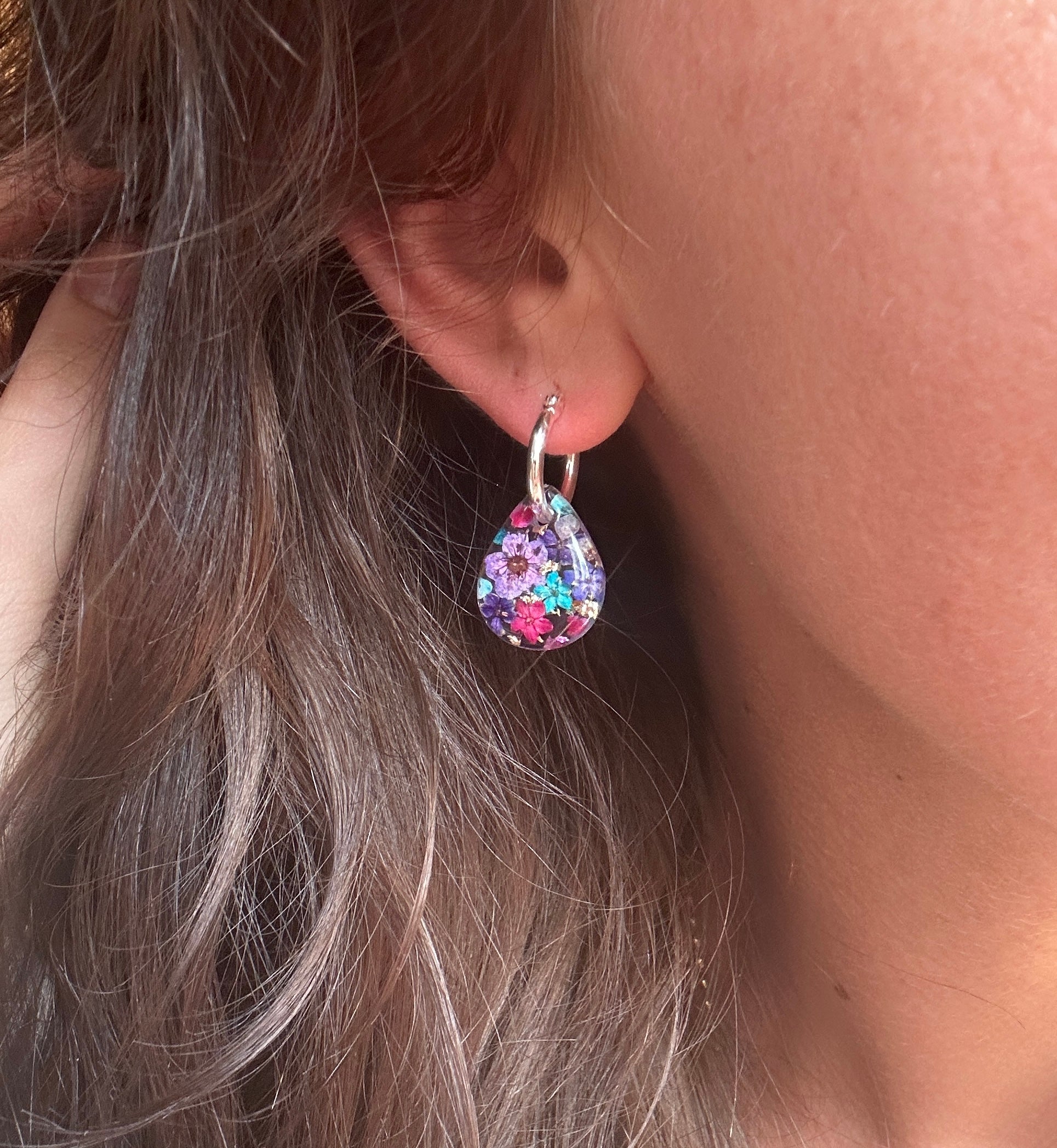 Purple Rain Bloom Teardrop hoop earrings.