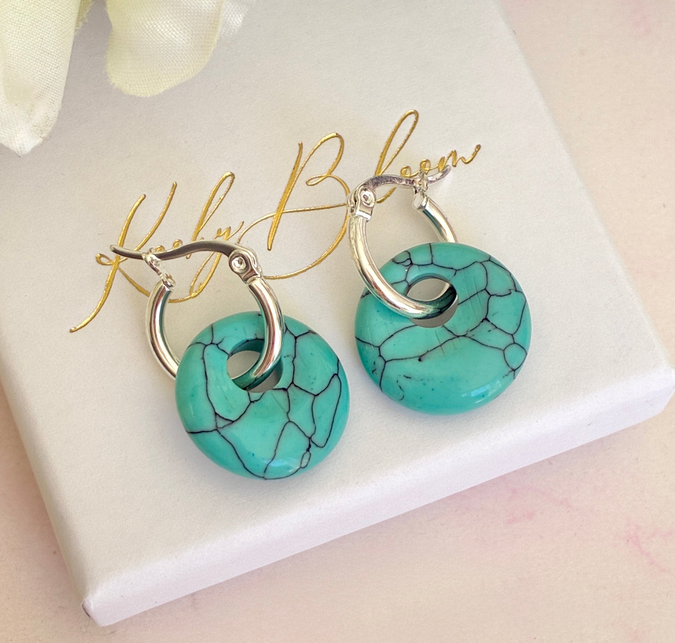 Silver Turquoise Donut earrings.