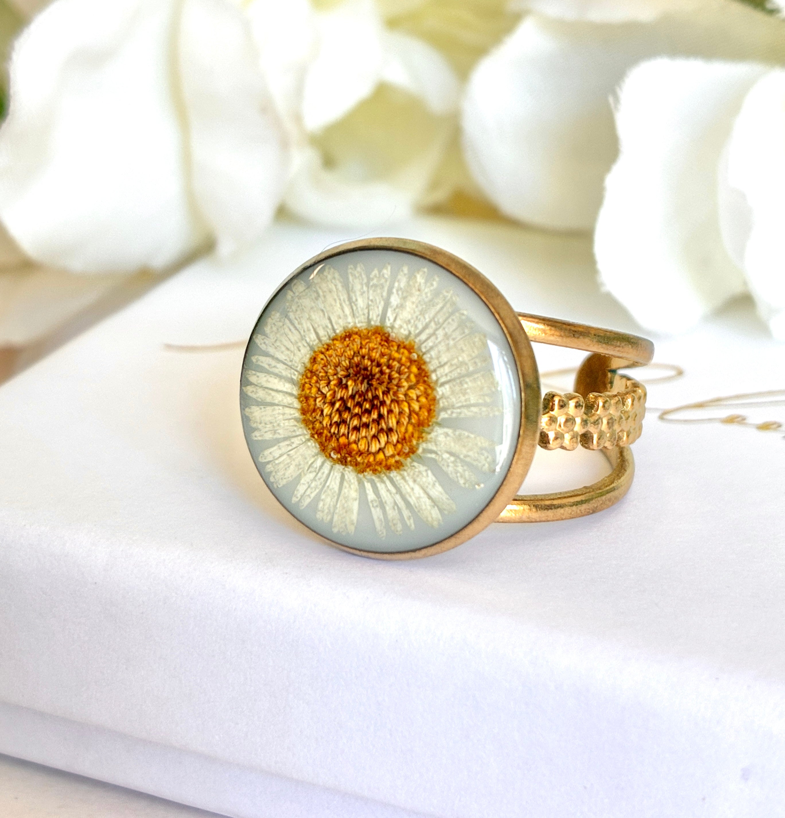 Gold Daisy Bloom cuff ring.