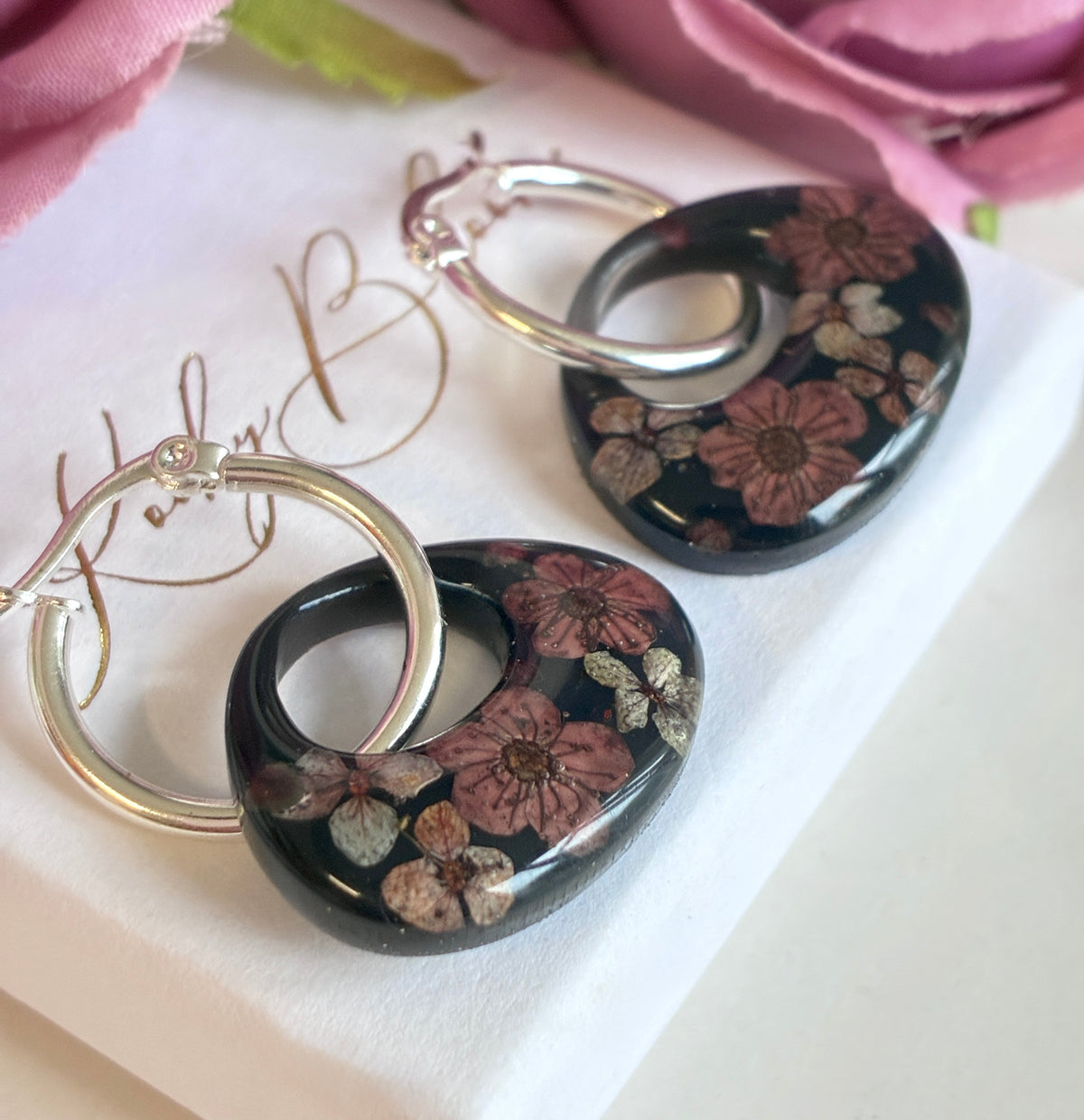Dark chocolate blossom Oval hoop earrings.