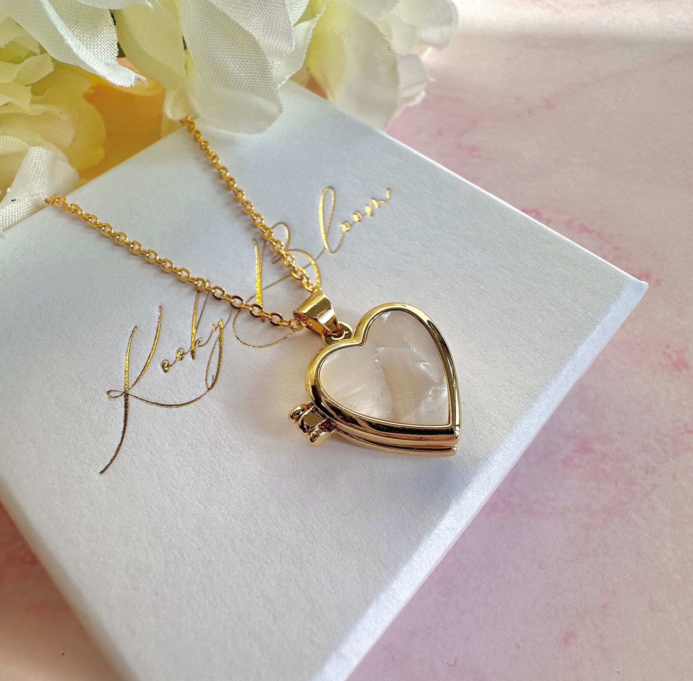 Gold Pearl Shell Heart Locket necklace.