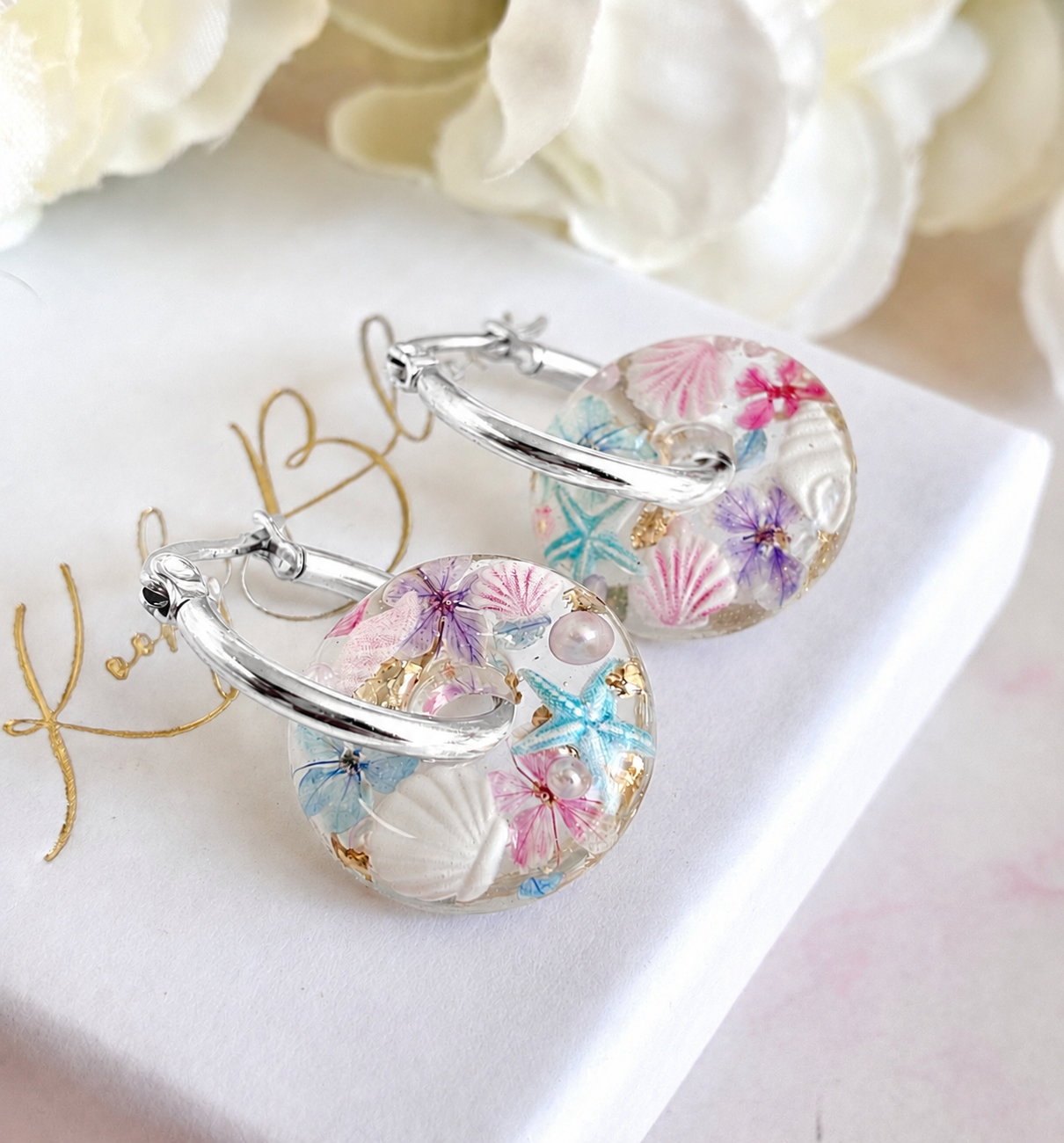 Pastel Mini seaside bloom donut earrings.