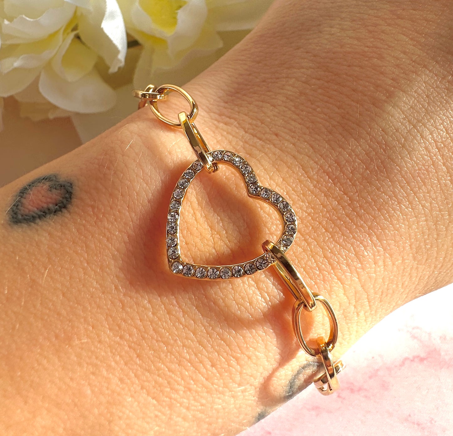 Gold Cz Heart link bracelet.