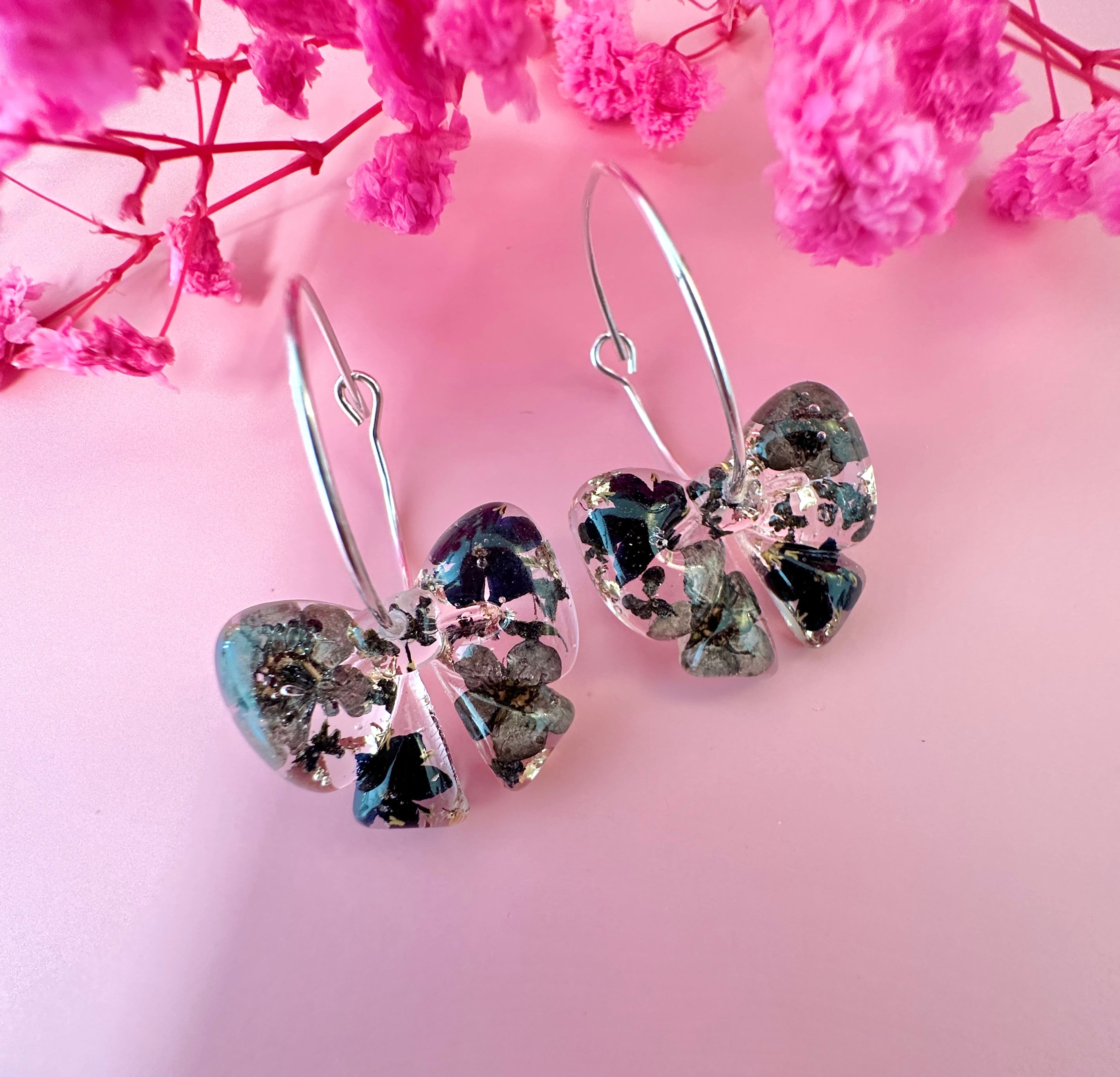 Black ebony Bloom Bow hoop Earrings.