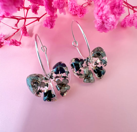 Black ebony Bloom Bow hoop Earrings.