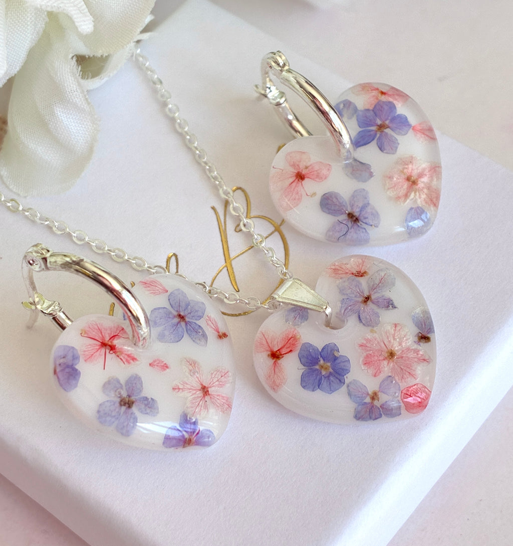 Marshmallow bloom heart earrings.