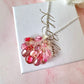 Silver Pink Coral Seashell Bloom necklace.