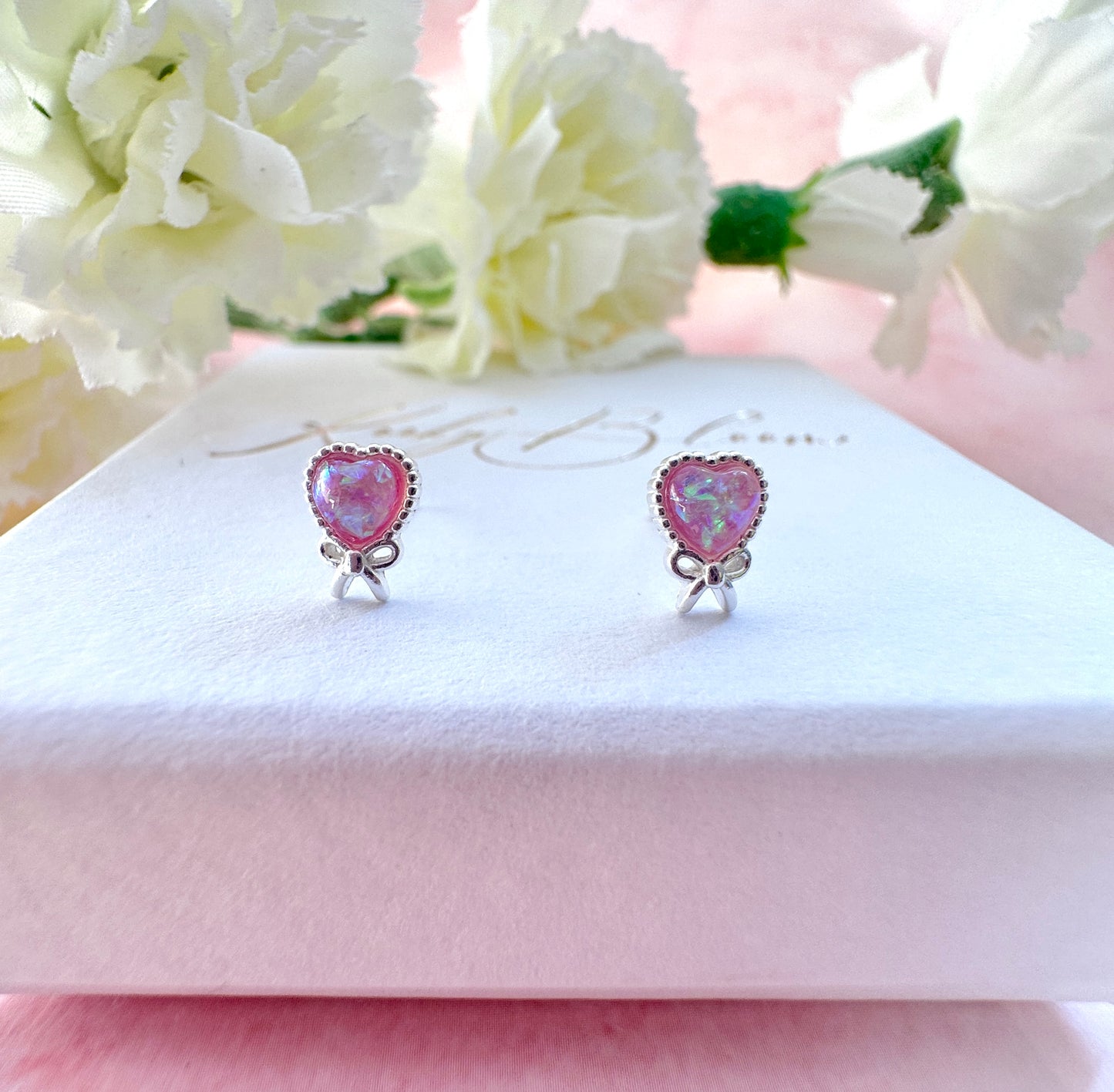 925 Sterling Silver Pink Opal heart Bow stud earrings.
