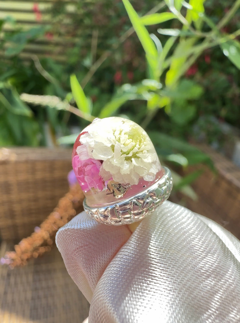 Acorn real flower silver necklace.