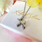 Silver Balloon dog necklace.
