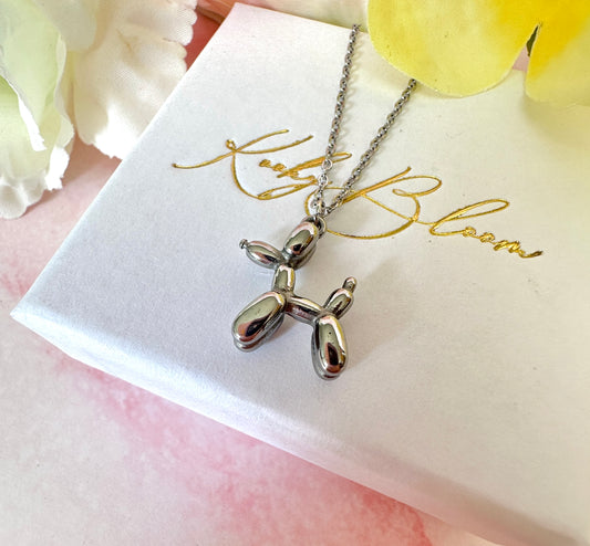 Silver Balloon dog necklace.