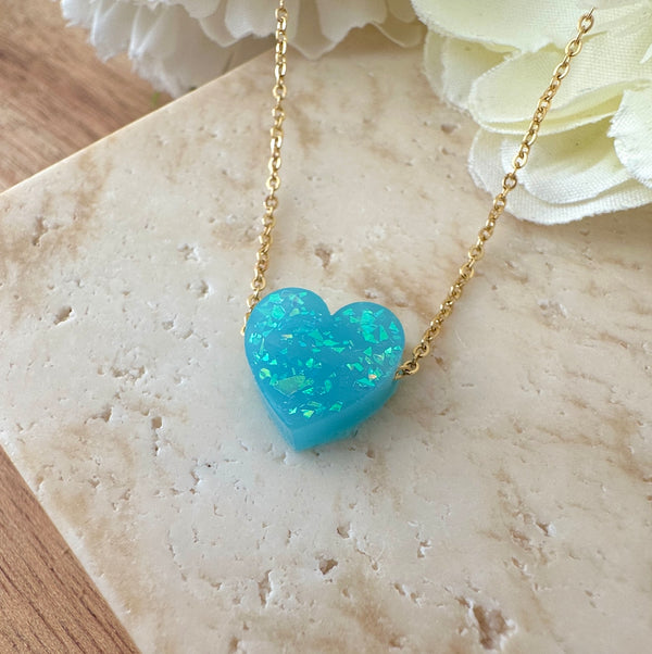 Gold Aqua Blue Opal effect heart necklace.