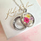 Silver Real flower capsule locket necklace.