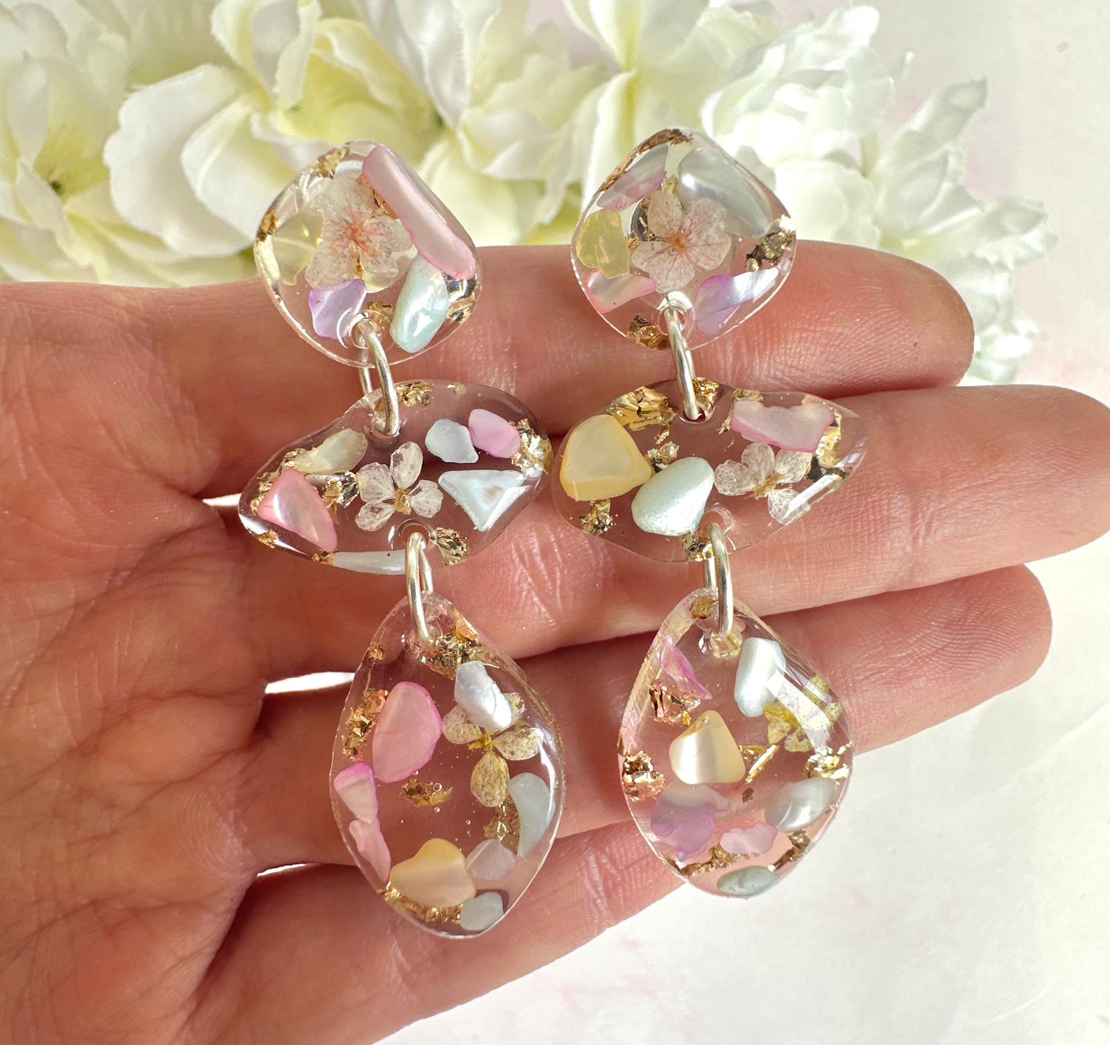 Pastel Seashell & Bloom pebble drop stud earrings.