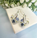 Mini Powder Blue Forget me not heart hoop earrings.