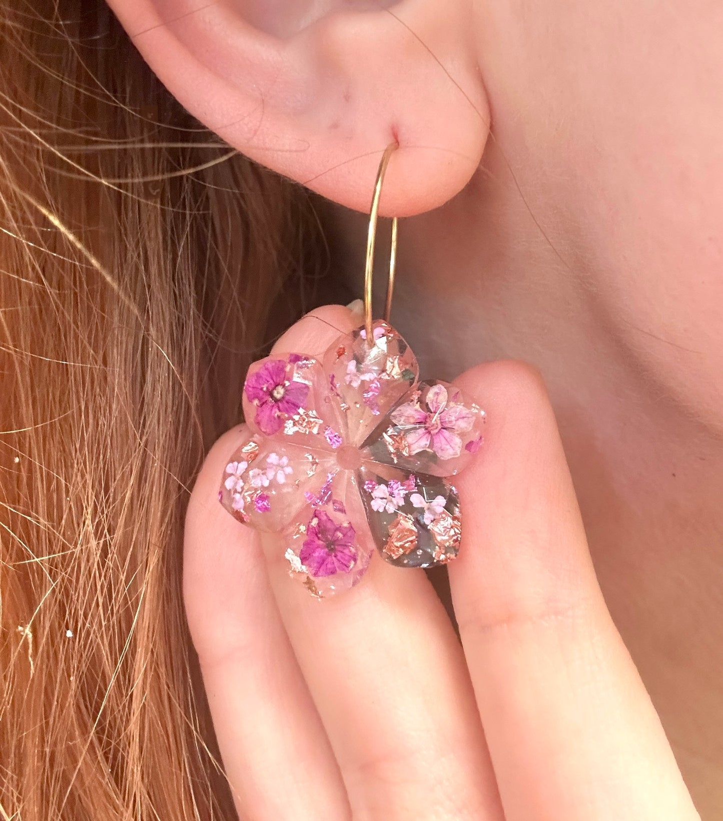 Plumb Blossom diamond cut flower earrings.