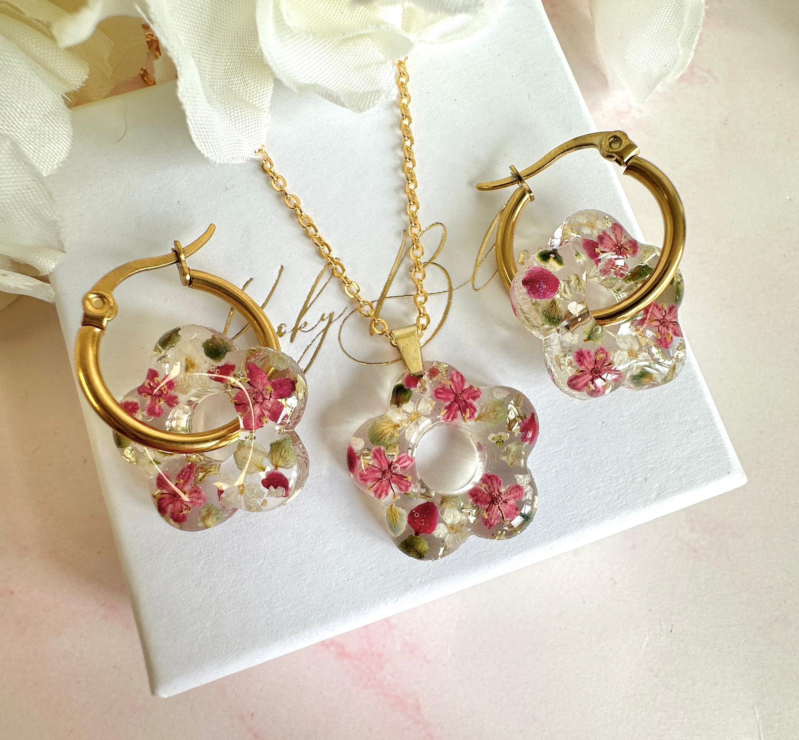 Raspberry ripple Bloom Flower hoop earrings.