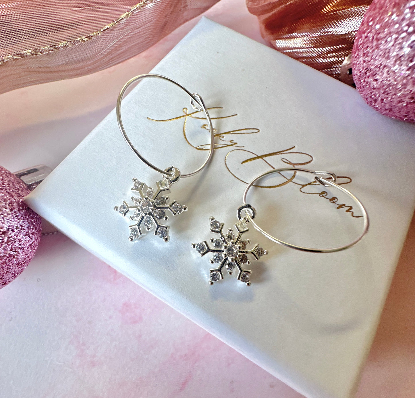 Silver CZ snowflake 925 Sterling hoop earrings.