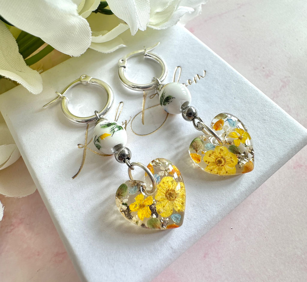 Sunflower Bead Blossom heart drop hoop earrings.