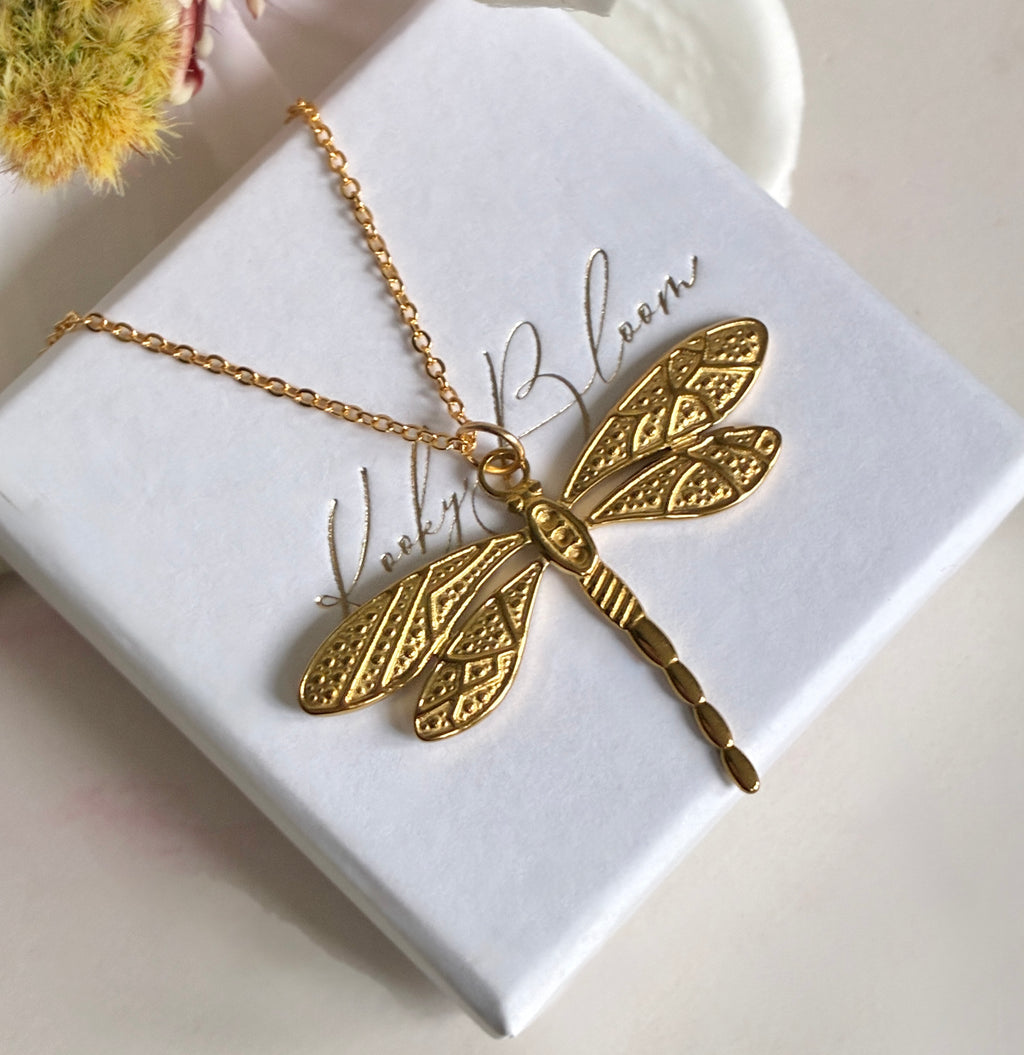 Gold Dragonfly necklace.