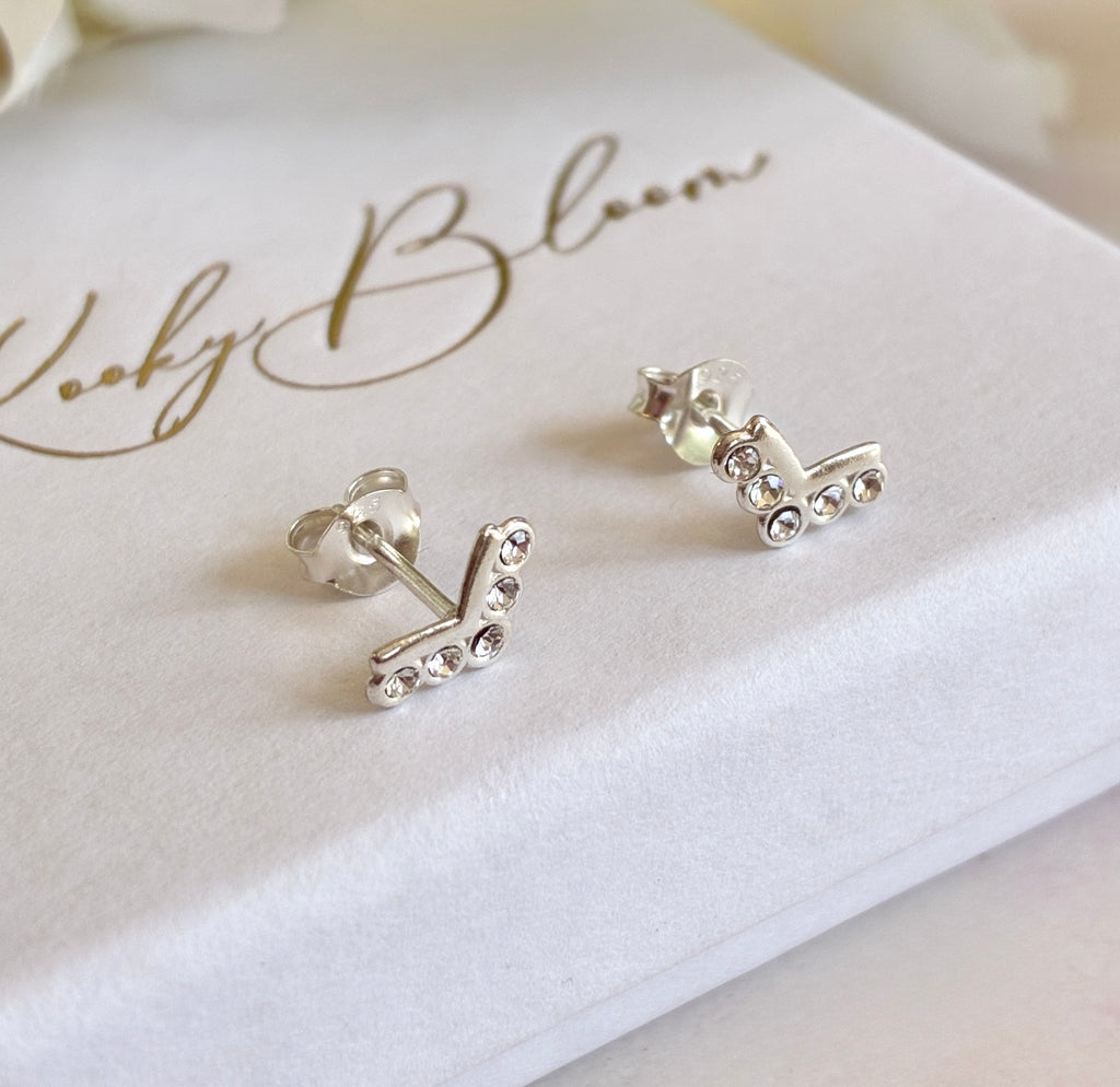 925 sterling silver V Diamanté stud earrings.