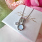 Silver Opalescent Cz Cluster charm necklace.