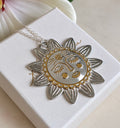 Silver Bohemian Gold detail Sun face necklace.