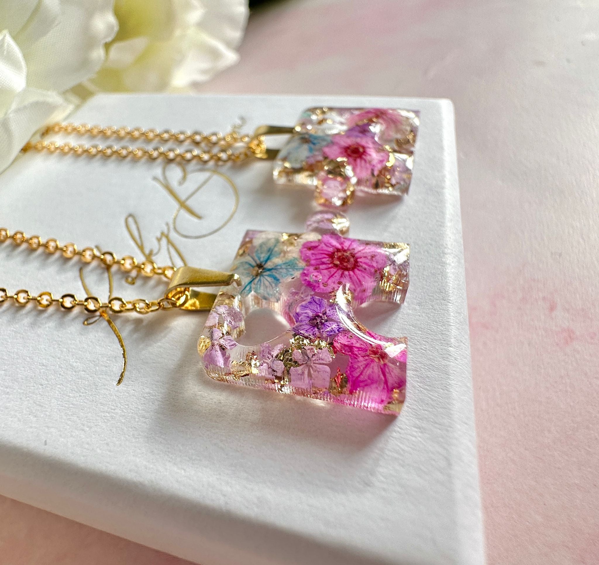 Gold real flower Jigsaw puzzle piece necklace.