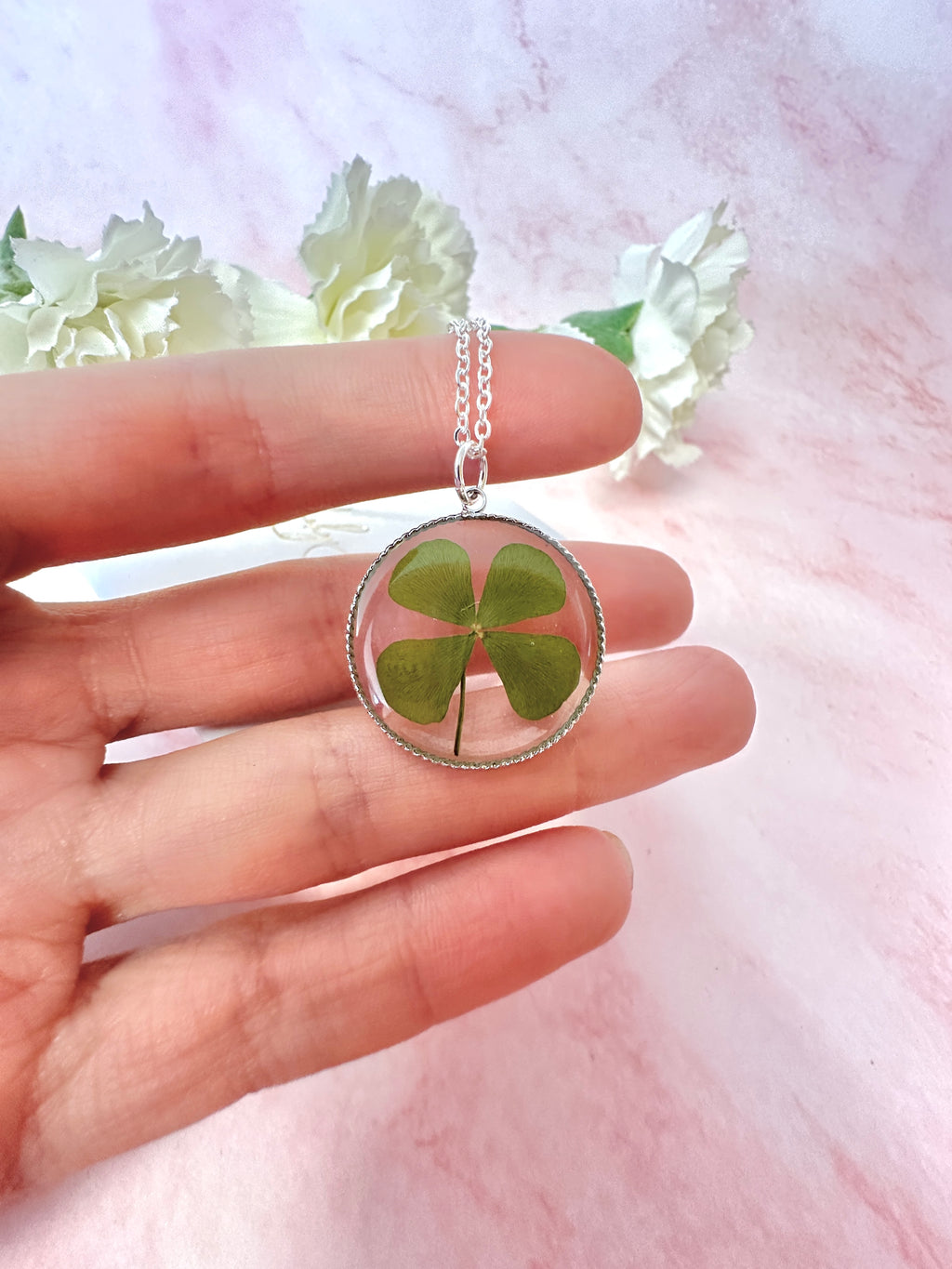 Silver Lucky four leaf clover necklace.