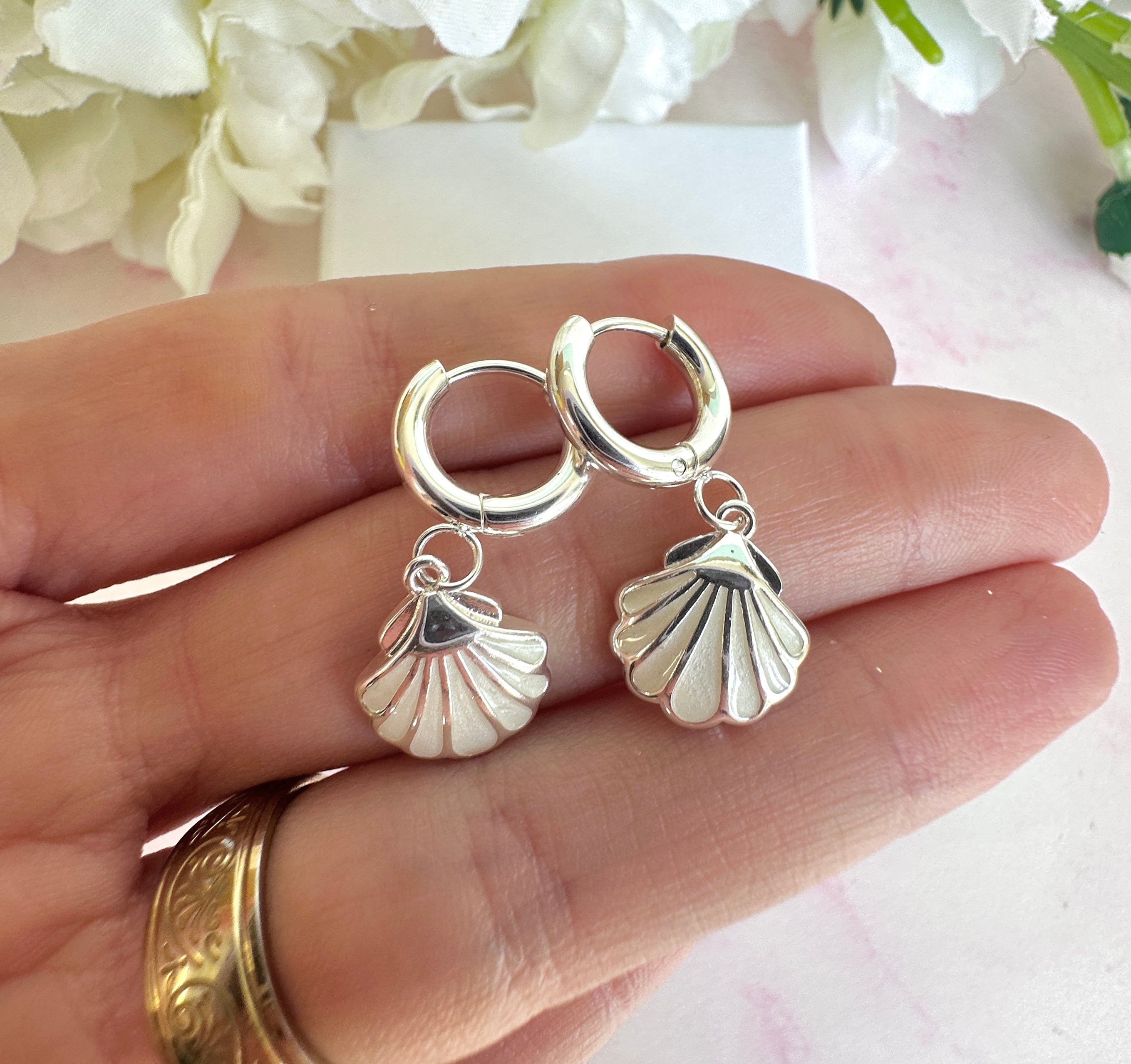 Silver Pearlescent Seashell Chunky huggie hoop earrings.